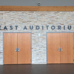 east auditorium wall text